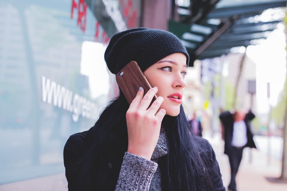picture of a women calling on her cell phone